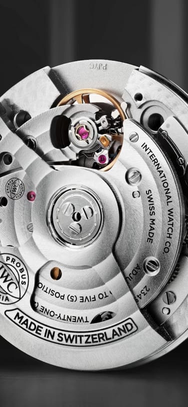 The IWC manufactured 32100 calibre displayed the IWC logo with "Made in Swiizerland" as well as other information engraved into the surface.