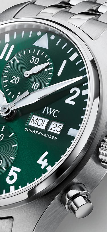 Close-up of an IWC Schaffhausen Pilot's Watch Chronograph 41, reference IW388104, with a green dial and a stainless steel bracelet.