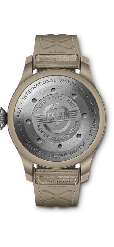 Back of Watch dial with engraving 'TOP GUN', 'United States Navy', 'Fighter Weapons School'.