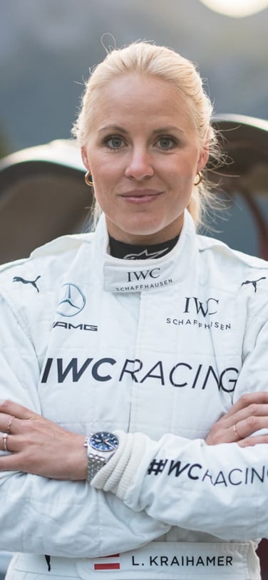 Laura Kraihamer in white racing costume.