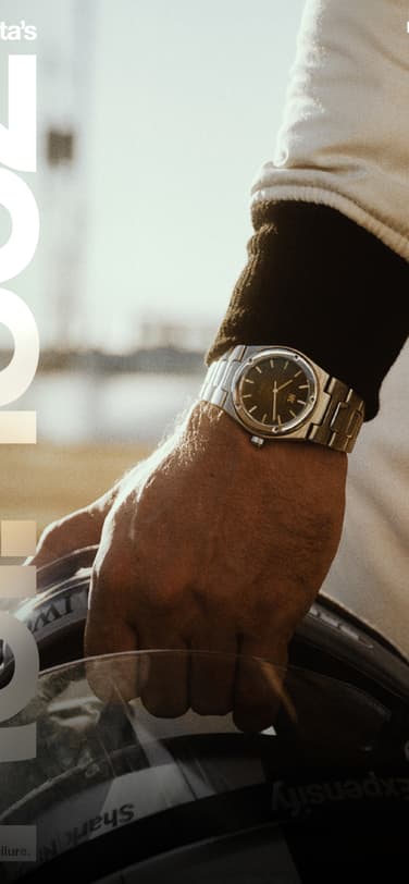 IWC万国表工程师SL腕表短片海报。持头盔的手上佩戴绿色表盘工程师自动腕表40。