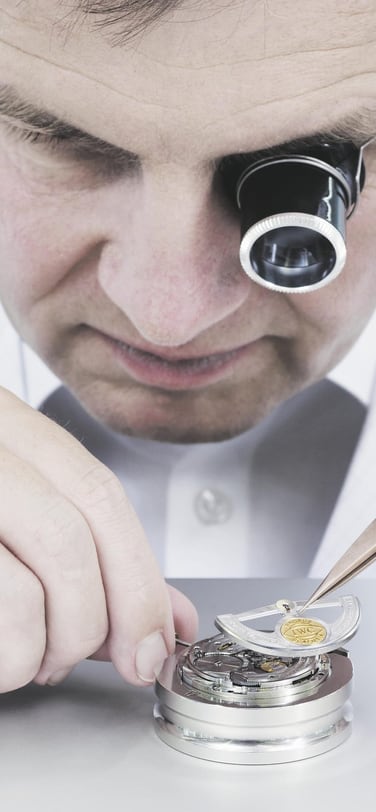 Image showing an IWC watch dial being worked on