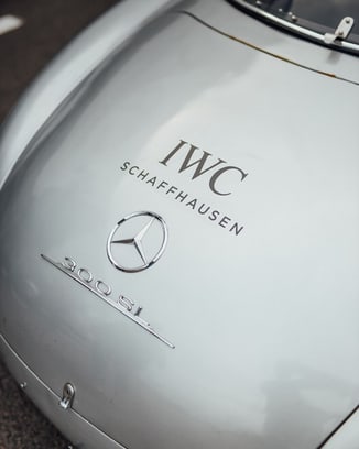 The back of a 300 SL Mercedes race car with the IWC Schaffhausen name。